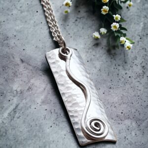Silver hammered necklace with spiral