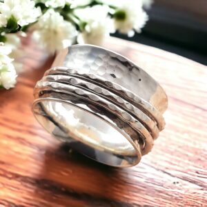 Silver spinning ring with 3 bands