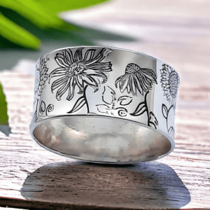 silver ring with flower motifs handmade from recycled silver in Dorset