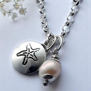 Silver and pearl starfish charm necklace