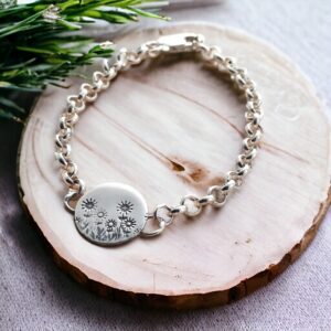 Silver daisy charm bracelet