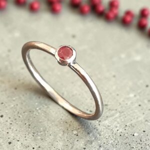 Hammered 9ct gold stacking ring with ruby