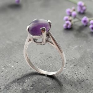 Silver claw set amethyst ring