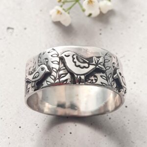 Handmade sterling silver robin and chick ring
