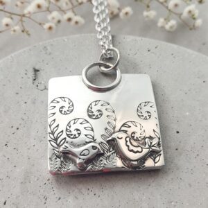 Handmade sterling silver bird and fern square necklace